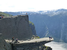 Trolltunga and Gard on the edge in the background