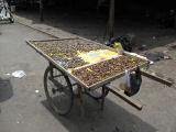Mussles in marinade at a market in Phnom Penh, Cambodia