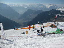 Paraglider preparing in the slopes above Verbier