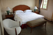 Bed at Raffles Hotel Le Royal in Phnom Penh