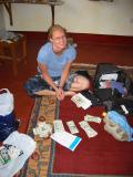 Avril is trying to distribute money in the tipping game