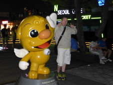 Gard with an Asian pose at N Tower in Seoul