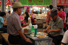 Locals enjoying lunch at Kwang Jang market