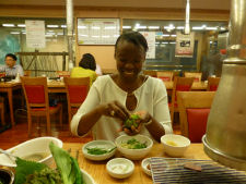 Nikki having galbi at Chamsutgol in Seoul